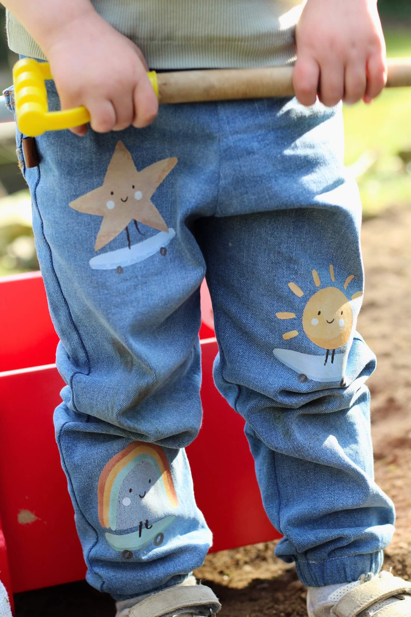 Kind mit Bügelbild Stern