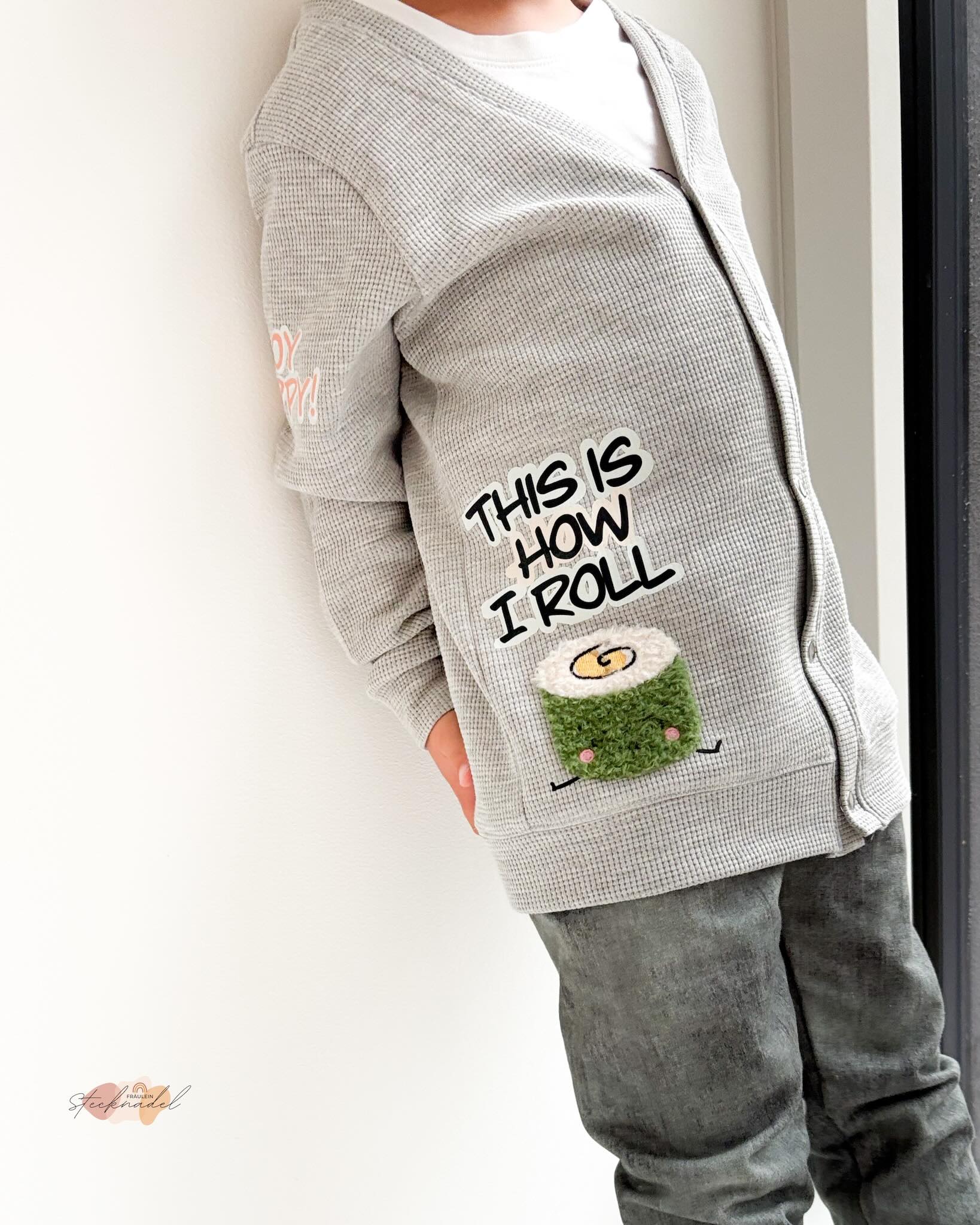 Kind mit Flauschi-Patch Maki