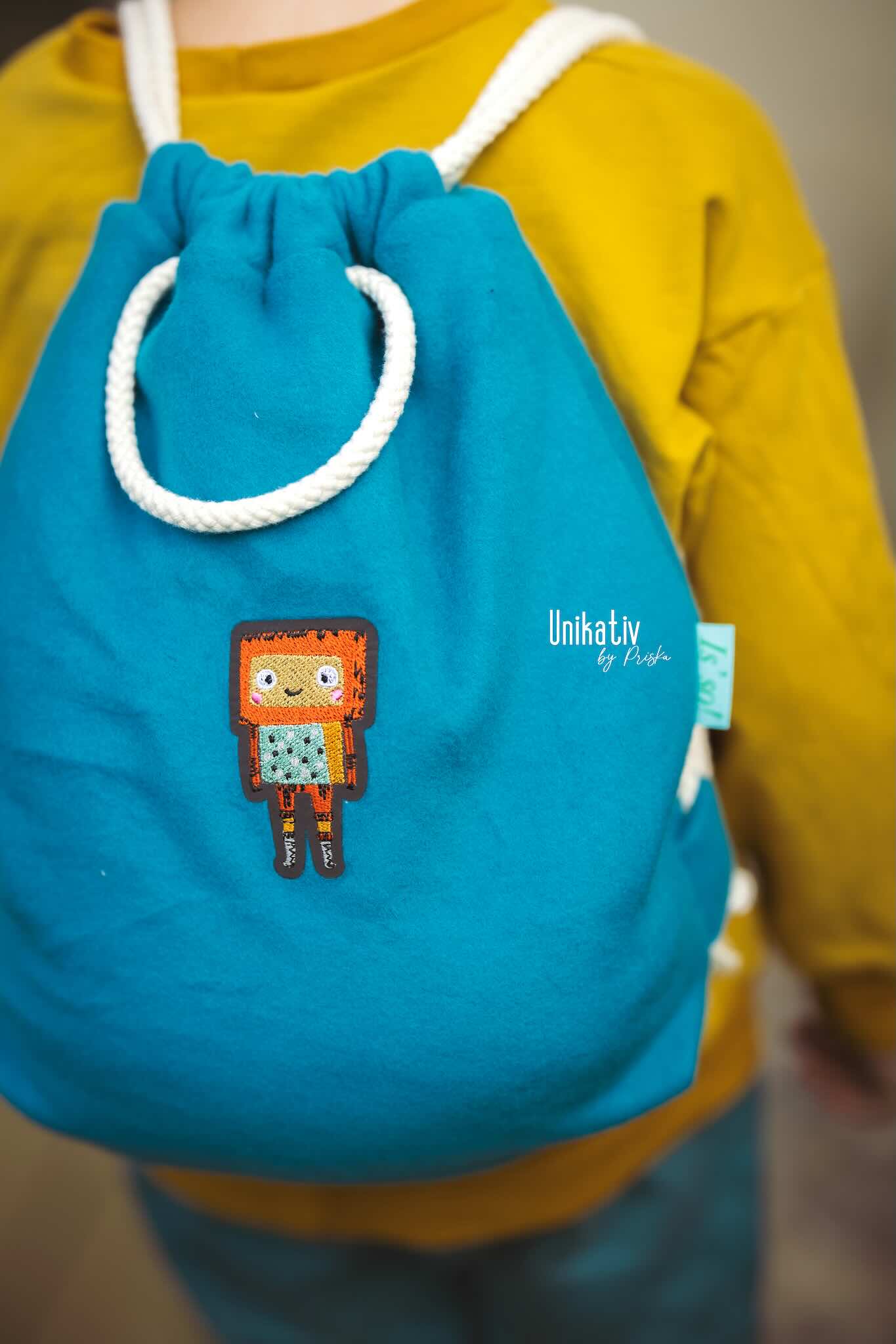 Eine Tasche mit Reflektor Patch Roboter