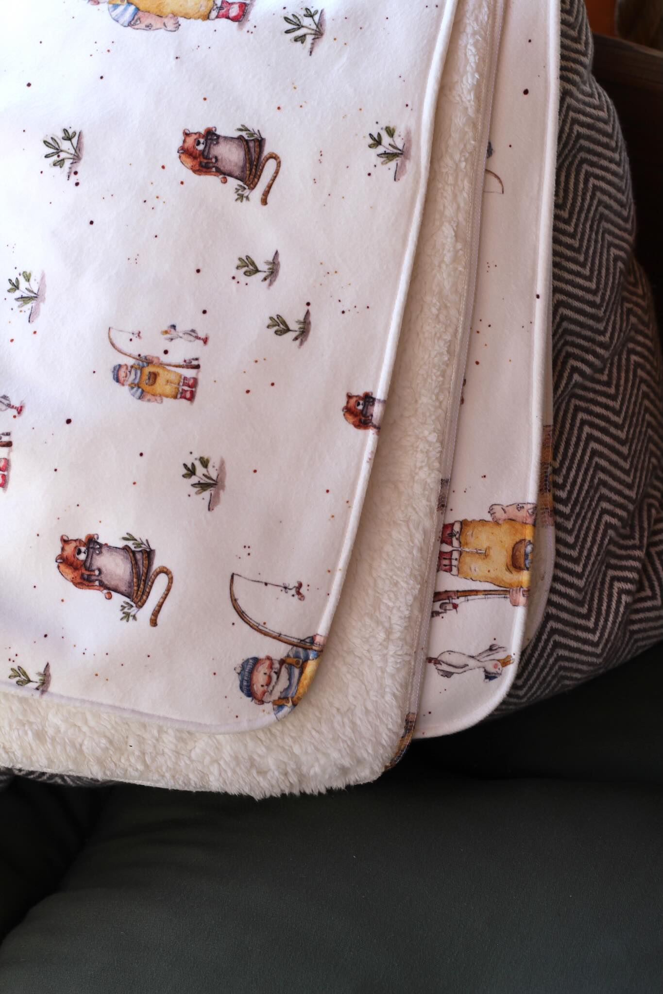 Sherpa-Fleece Decke im Tönn Tüdelhaken Design