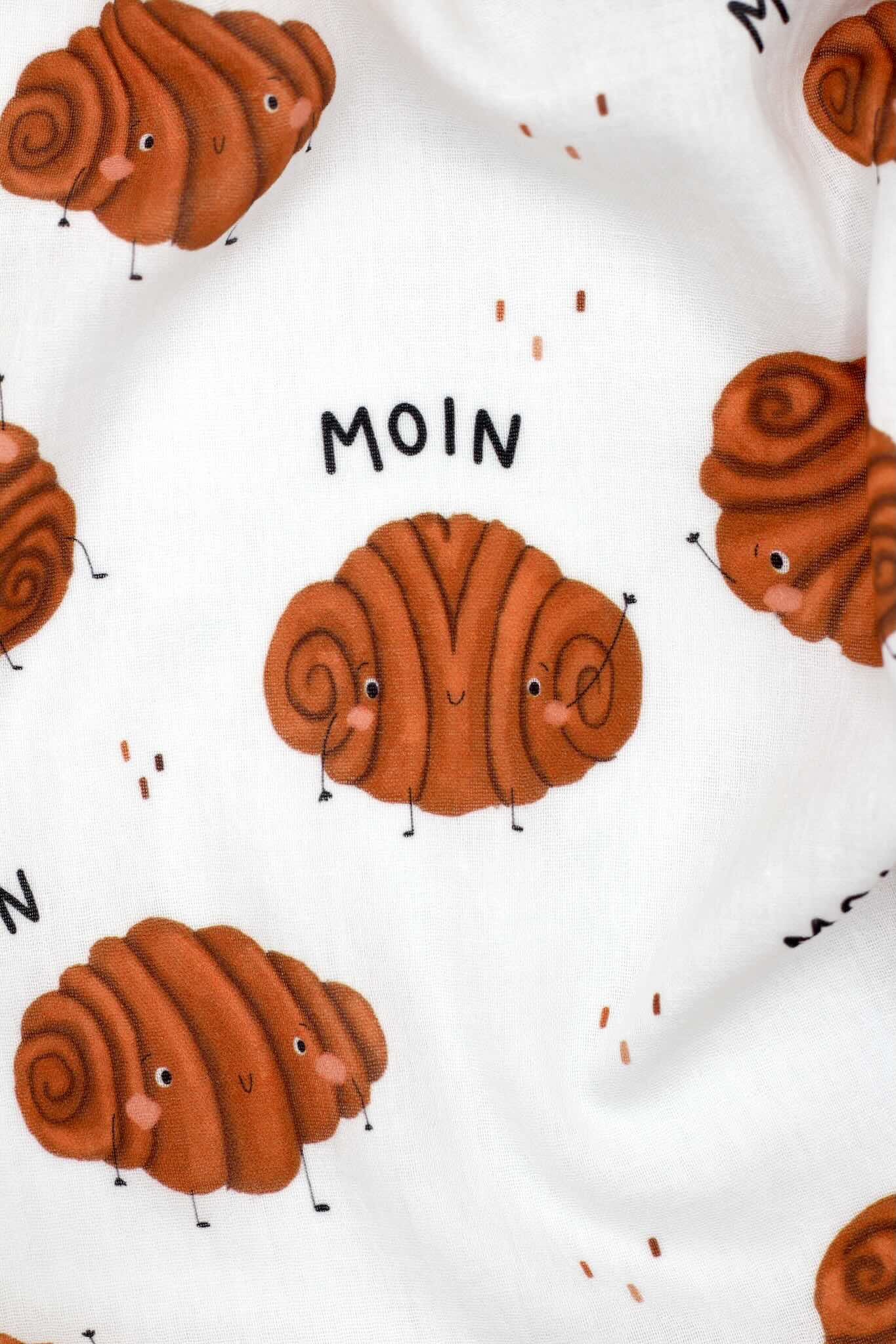 Musselin mit Franzbrörtchen-Motiv
